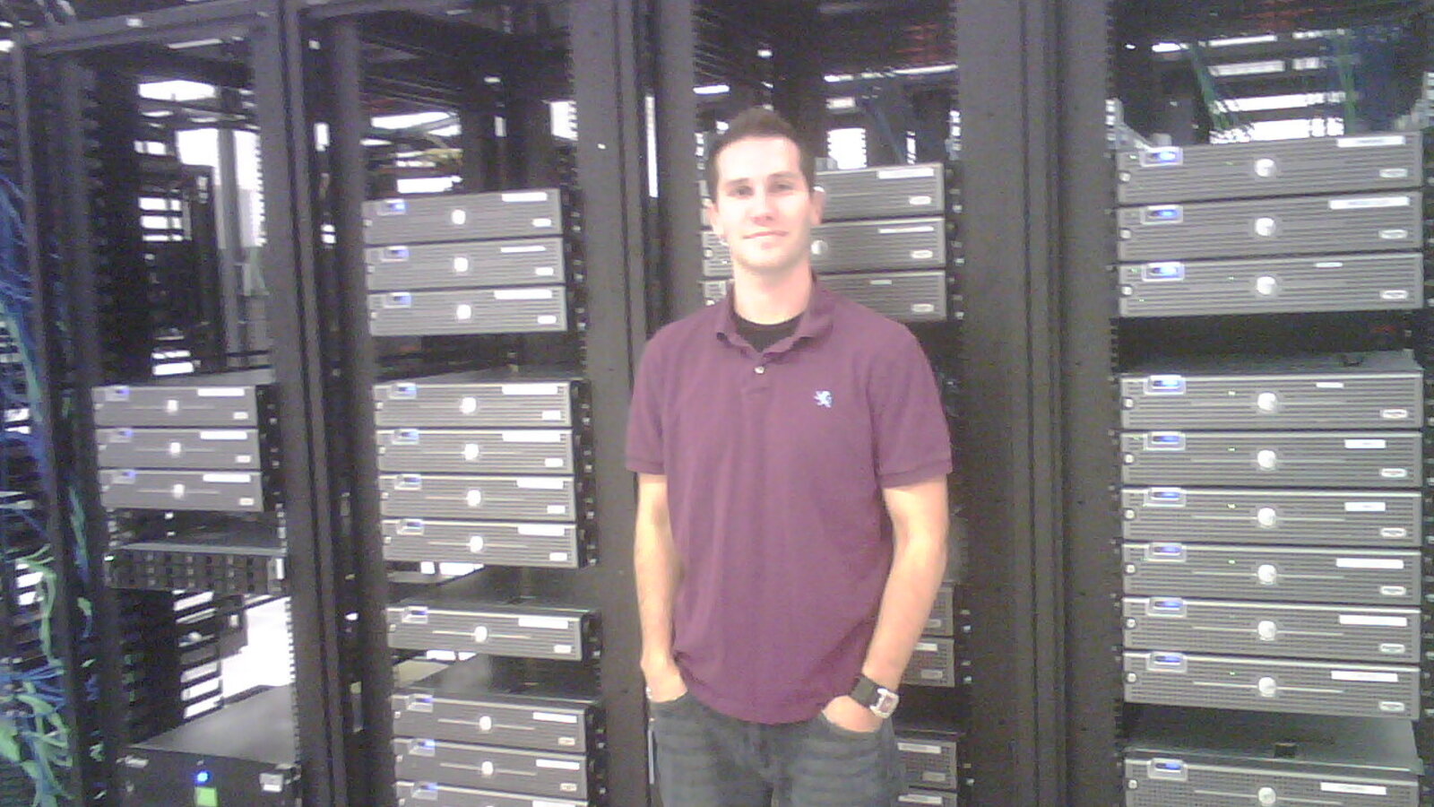 Chris Fischer standing in front of Beatport server racks in September 2008