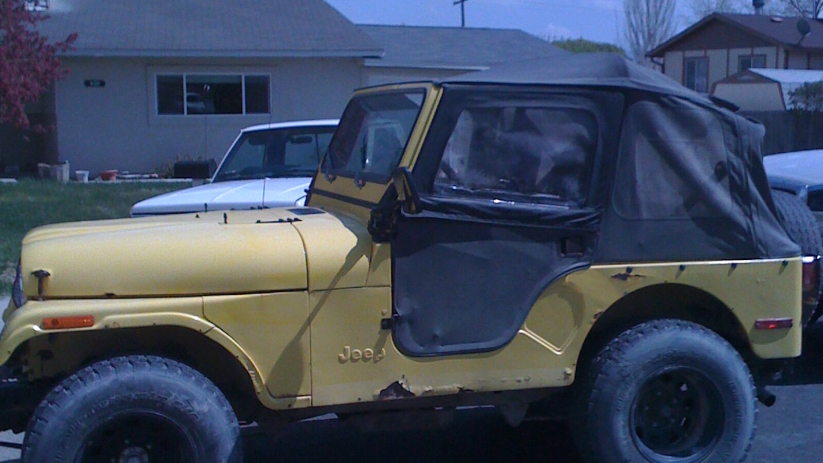 The yellow 1977 Jeep CJ-5 during the April 2009 purchase
