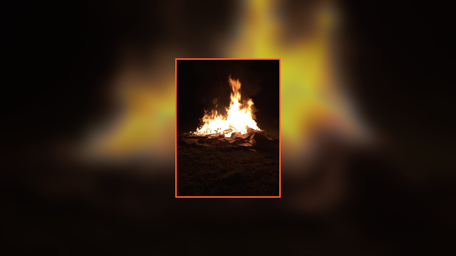Demolition debris burning during a September 2015 rebuilding weekend at the Fischer family house in Indiana