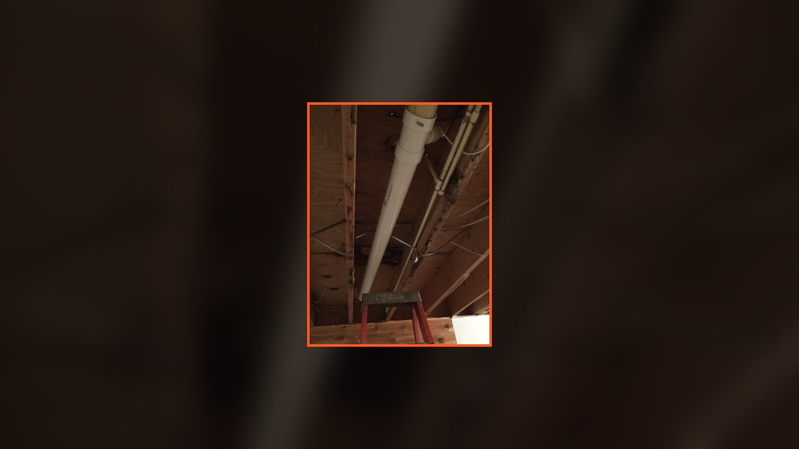 Exposed ceiling and plumbing during Christmas-break work on Chris Fischer's childhood home in Indiana