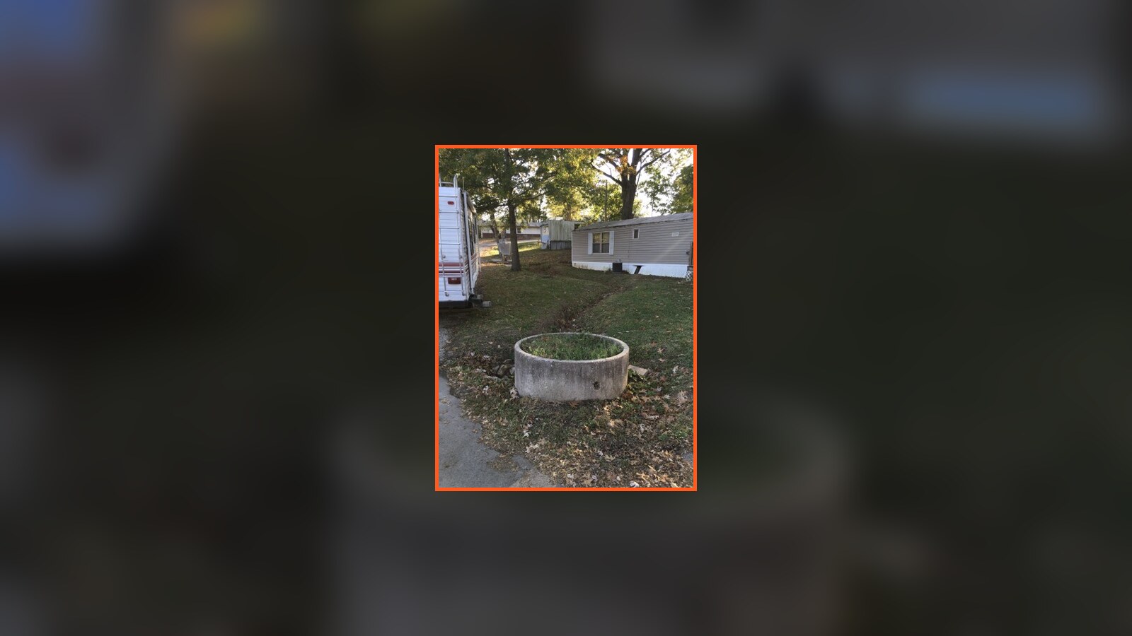 A concrete ring beside mobile homes during our October 2016 site visit in Columbia, Missouri