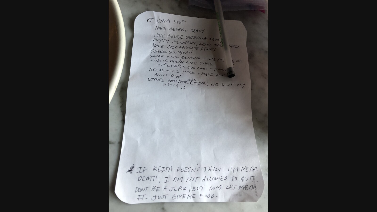 Handwritten Vermont 100 crew instructions ending with a warning not to let Chris quit unless he looked near death