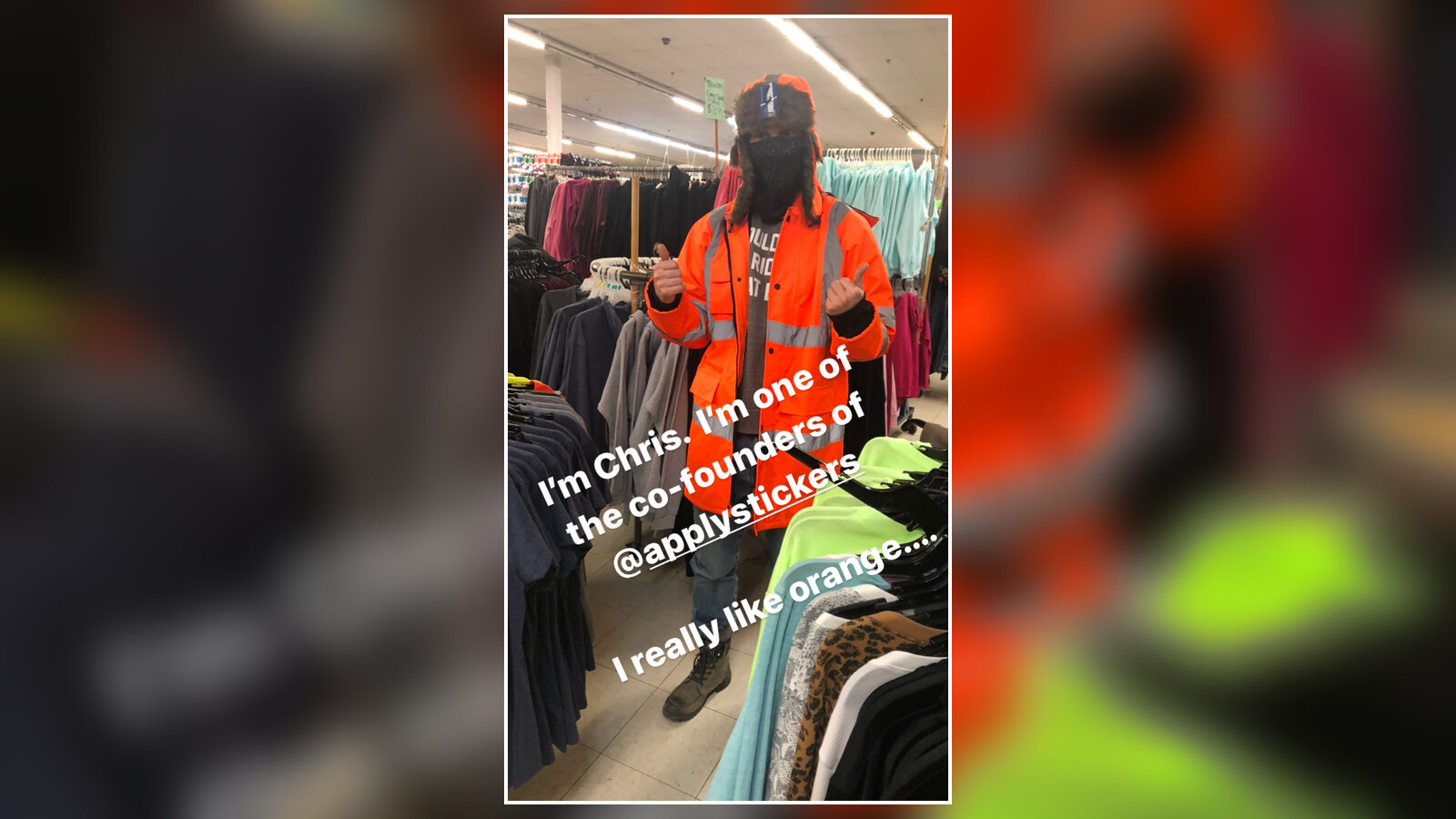 Chris Fischer in a bright orange safety jacket introducing himself as an Apply Stickers cofounder