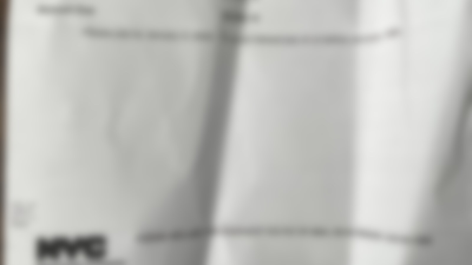 A blurred property tax statement among the financial paperwork Chris gathered while making a house offer