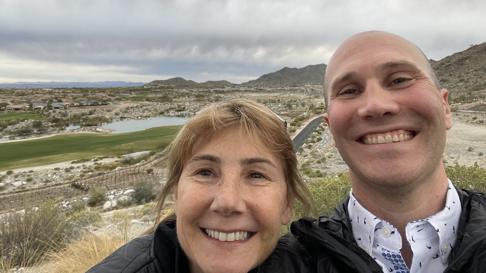 Chris and his mother Gisi smiling together in the hills outside Phoenix