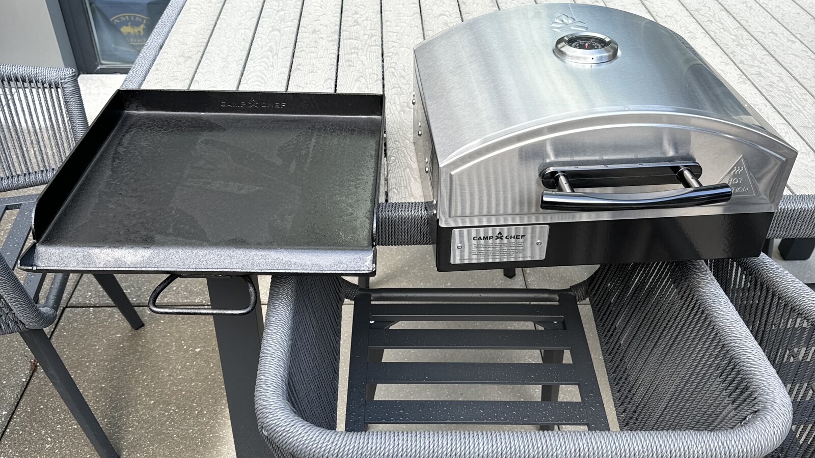 A flat-top griddle and compact pizza oven set up together on Chris's patio